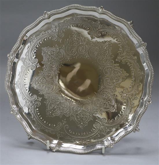 A Victorian engraved silver salver, Thomas Bradbury & Sons, London, 1874, 19 oz.